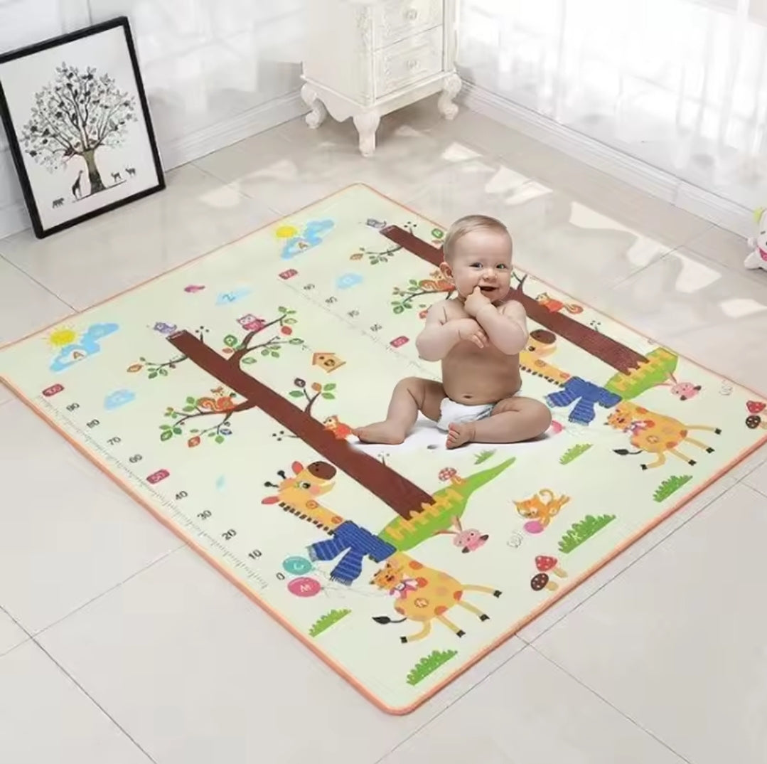 Soft, colorful baby crawling carpet with engaging patterns and textures, designed to stimulate infants' senses and support safe playtime.